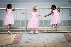 Young flower girls holding hands. Annapolis Maryland wedding
